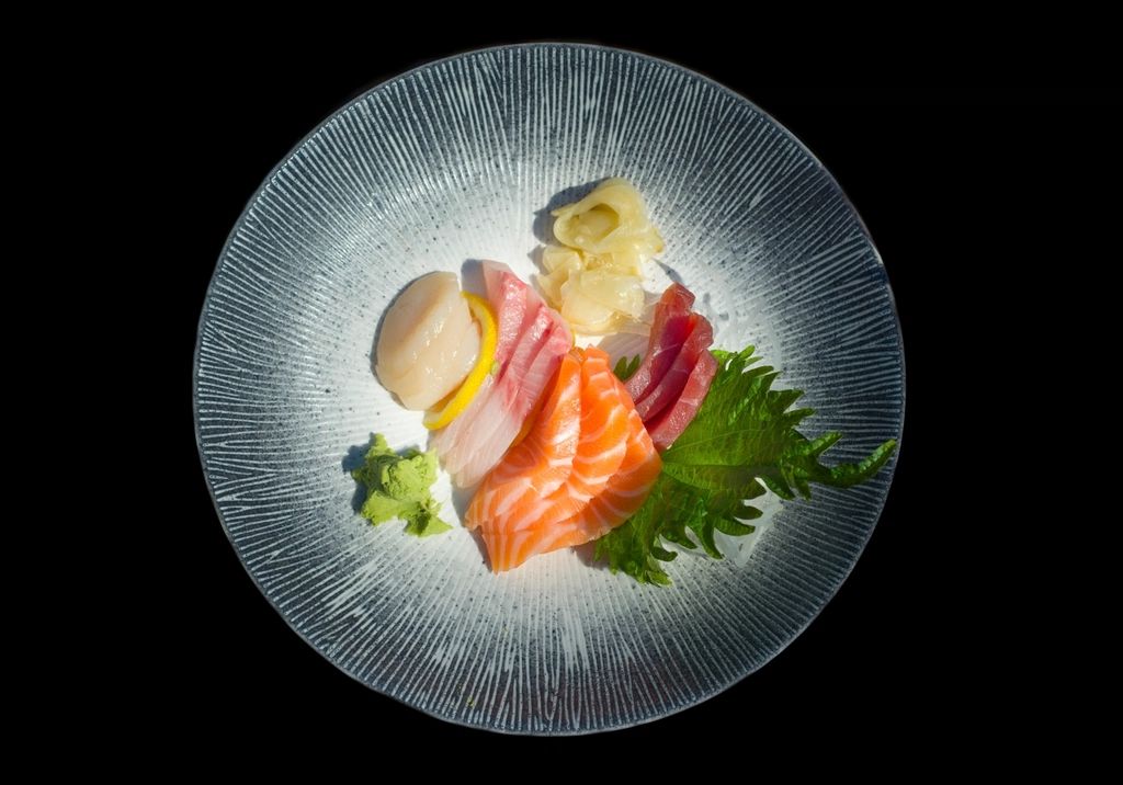 A seafood dish plated and ready to serve